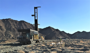Sonic drill rig of Yellow Jacket Drilling Services, LLC on the American Girl historical heap leach pad (hole AGS-01)