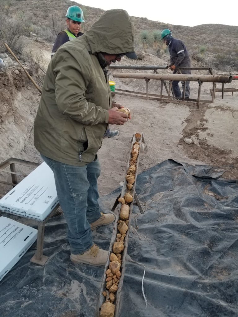 Geologist Humberto Pacheco trying hard to not lick the core.jpeg